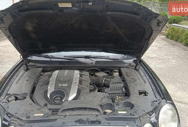 Черный Киа Опирус, объемом двигателя 3.78 л и пробегом 185 тыс. км за 6800 $, фото 21 на Automoto.ua