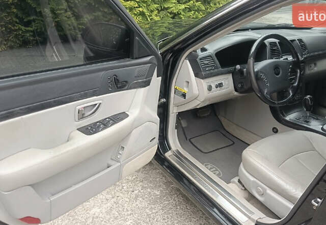 Черный Киа Опирус, объемом двигателя 3.78 л и пробегом 185 тыс. км за 6800 $, фото 10 на Automoto.ua