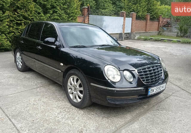 Черный Киа Опирус, объемом двигателя 3.78 л и пробегом 185 тыс. км за 6800 $, фото 1 на Automoto.ua