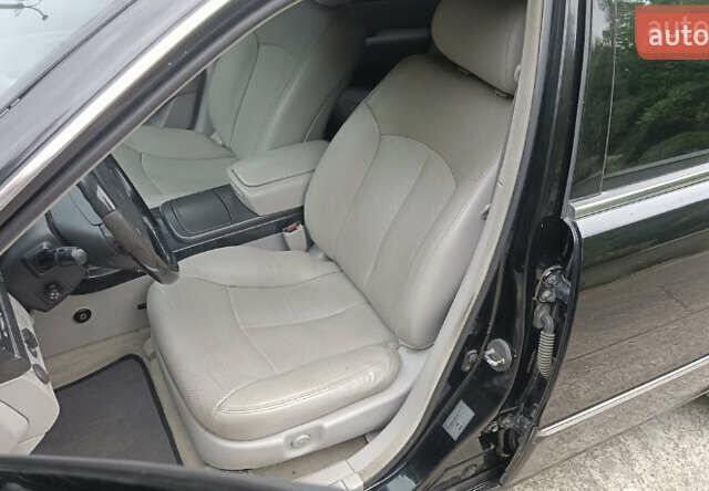 Черный Киа Опирус, объемом двигателя 3.78 л и пробегом 185 тыс. км за 6800 $, фото 11 на Automoto.ua