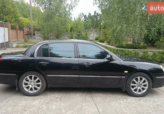 Черный Киа Опирус, объемом двигателя 3.78 л и пробегом 185 тыс. км за 6800 $, фото 4 на Automoto.ua