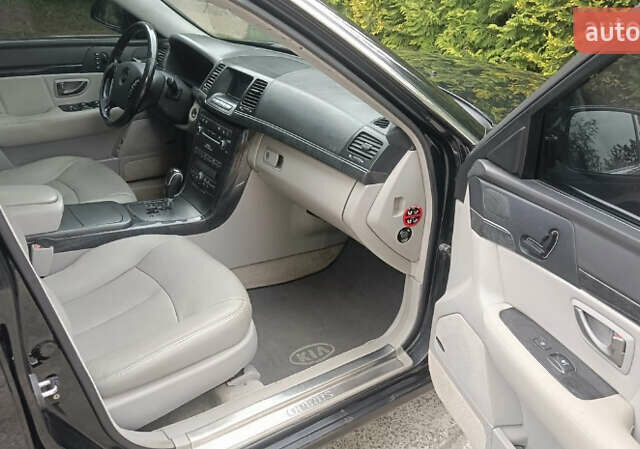 Черный Киа Опирус, объемом двигателя 3.78 л и пробегом 185 тыс. км за 6800 $, фото 12 на Automoto.ua