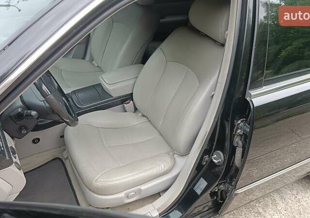 Черный Киа Опирус, объемом двигателя 3.78 л и пробегом 185 тыс. км за 6800 $, фото 11 на Automoto.ua