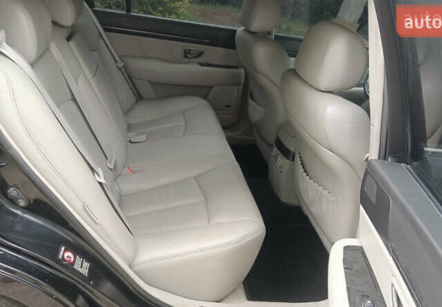 Черный Киа Опирус, объемом двигателя 3.78 л и пробегом 185 тыс. км за 6800 $, фото 15 на Automoto.ua