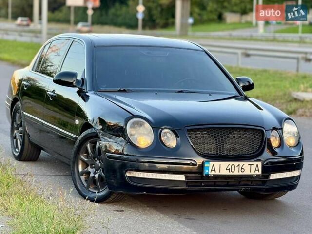 Черный Киа Опирус, объемом двигателя 3.8 л и пробегом 225 тыс. км за 6500 $, фото 4 на Automoto.ua