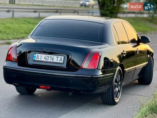 Черный Киа Опирус, объемом двигателя 3.8 л и пробегом 225 тыс. км за 6500 $, фото 1 на Automoto.ua