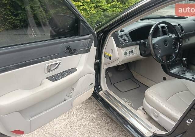 Черный Киа Опирус, объемом двигателя 3.78 л и пробегом 185 тыс. км за 6800 $, фото 10 на Automoto.ua