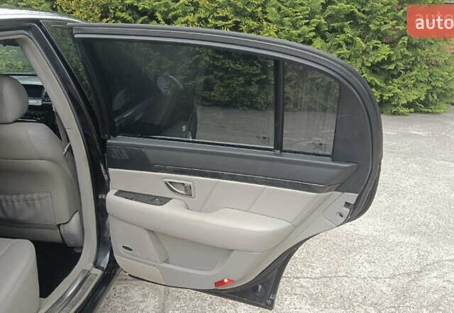 Черный Киа Опирус, объемом двигателя 3.78 л и пробегом 185 тыс. км за 6800 $, фото 14 на Automoto.ua