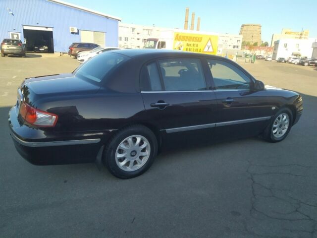 Коричневий Кіа Опірус, об'ємом двигуна 3.5 л та пробігом 150 тис. км за 4199 $, фото 9 на Automoto.ua