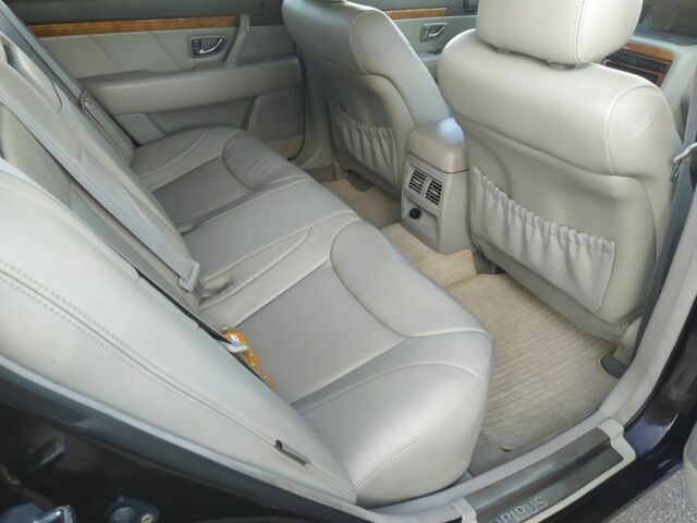 Коричневий Кіа Опірус, об'ємом двигуна 3.5 л та пробігом 150 тис. км за 4199 $, фото 8 на Automoto.ua