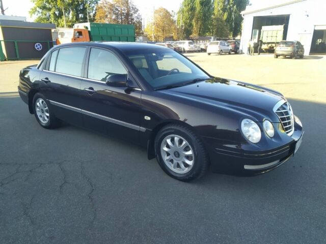 Коричневий Кіа Опірус, об'ємом двигуна 3.5 л та пробігом 150 тис. км за 4199 $, фото 10 на Automoto.ua