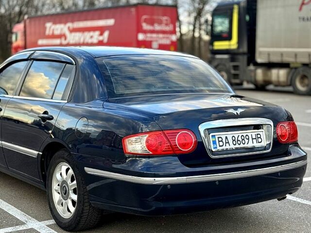 Синій Кіа Опірус, об'ємом двигуна 3.5 л та пробігом 190 тис. км за 5500 $, фото 2 на Automoto.ua
