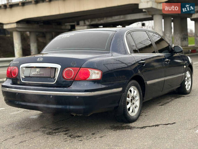 Синій Кіа Опірус, об'ємом двигуна 0 л та пробігом 150 тис. км за 3900 $, фото 5 на Automoto.ua