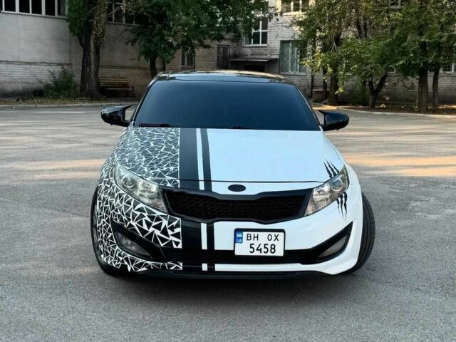 Белый Киа Оптима, объемом двигателя 2 л и пробегом 285 тыс. км за 8700 $, фото 1 на Automoto.ua