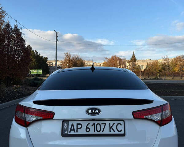 Белый Киа Оптима, объемом двигателя 2 л и пробегом 125 тыс. км за 9400 $, фото 3 на Automoto.ua