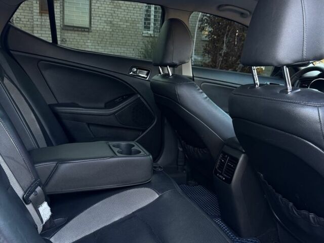 Белый Киа Оптима, объемом двигателя 2 л и пробегом 125 тыс. км за 9400 $, фото 7 на Automoto.ua