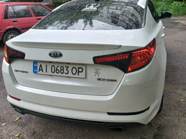 Белый Киа Оптима, объемом двигателя 2 л и пробегом 380 тыс. км за 9000 $, фото 2 на Automoto.ua