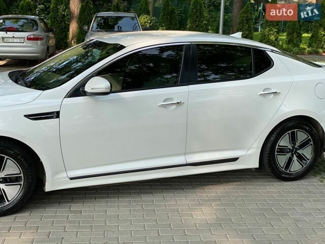 Білий Кіа Оптіма, об'ємом двигуна 2.4 л та пробігом 221 тис. км за 8200 $, фото 21 на Automoto.ua