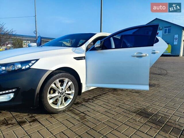 Белый Киа Оптима, объемом двигателя 2 л и пробегом 184 тыс. км за 6700 $, фото 1 на Automoto.ua