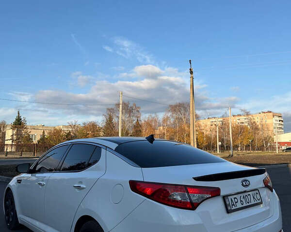 Белый Киа Оптима, объемом двигателя 2 л и пробегом 125 тыс. км за 9400 $, фото 2 на Automoto.ua