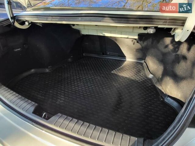 Белый Киа Оптима, объемом двигателя 2 л и пробегом 220 тыс. км за 9300 $, фото 6 на Automoto.ua