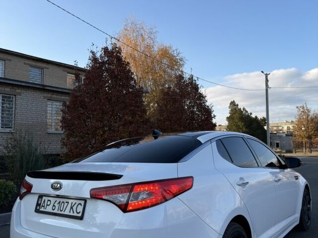 Белый Киа Оптима, объемом двигателя 2 л и пробегом 125 тыс. км за 9400 $, фото 2 на Automoto.ua