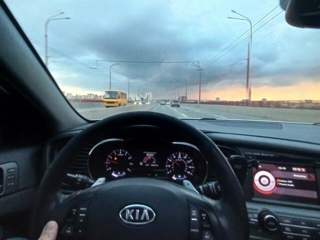 Белый Киа Оптима, объемом двигателя 2 л и пробегом 380 тыс. км за 9000 $, фото 5 на Automoto.ua