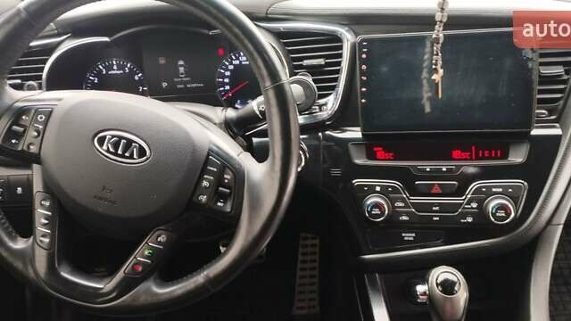 Білий Кіа Оптіма, об'ємом двигуна 2 л та пробігом 167 тис. км за 9000 $, фото 12 на Automoto.ua