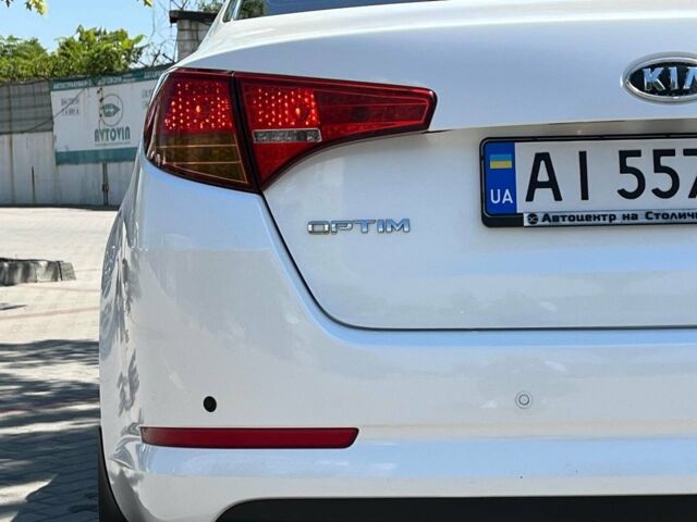 Белый Киа Оптима, объемом двигателя 2 л и пробегом 91 тыс. км за 8700 $, фото 4 на Automoto.ua