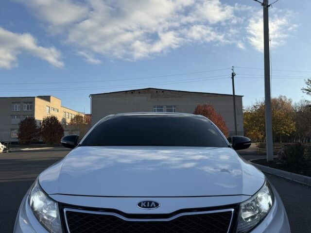 Белый Киа Оптима, объемом двигателя 2 л и пробегом 125 тыс. км за 9400 $, фото 1 на Automoto.ua