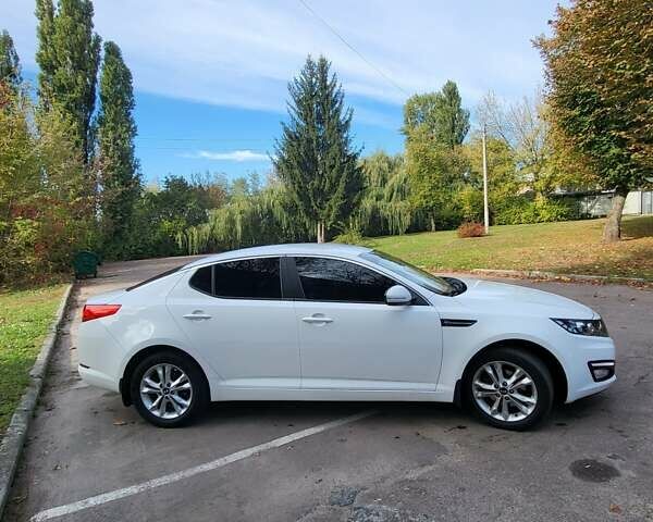 Белый Киа Оптима, объемом двигателя 2 л и пробегом 220 тыс. км за 9300 $, фото 3 на Automoto.ua