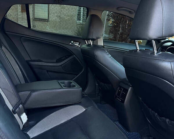 Белый Киа Оптима, объемом двигателя 2 л и пробегом 125 тыс. км за 9400 $, фото 7 на Automoto.ua