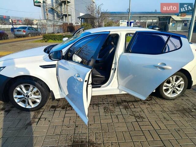 Белый Киа Оптима, объемом двигателя 2 л и пробегом 184 тыс. км за 6700 $, фото 2 на Automoto.ua