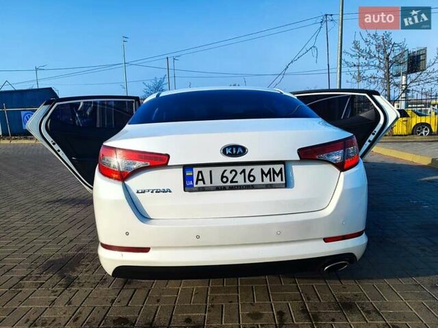 Белый Киа Оптима, объемом двигателя 2 л и пробегом 184 тыс. км за 6700 $, фото 5 на Automoto.ua