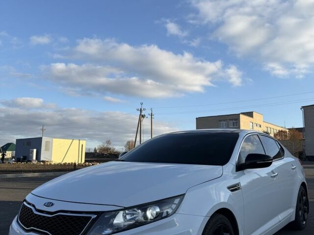 Белый Киа Оптима, объемом двигателя 2 л и пробегом 125 тыс. км за 9400 $, фото 4 на Automoto.ua