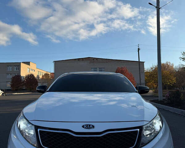 Белый Киа Оптима, объемом двигателя 2 л и пробегом 125 тыс. км за 9400 $, фото 1 на Automoto.ua