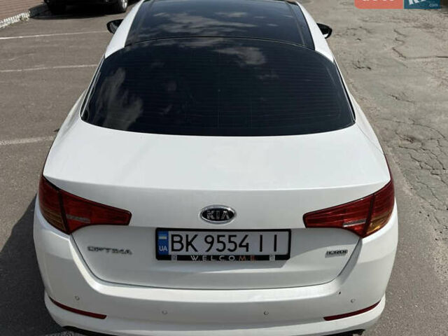 Белый Киа Оптима, объемом двигателя 1.69 л и пробегом 241 тыс. км за 12950 $, фото 8 на Automoto.ua
