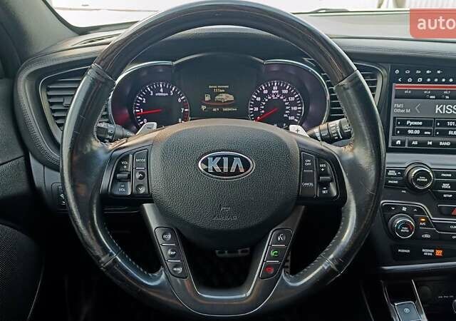 Білий Кіа Оптіма, об'ємом двигуна 2 л та пробігом 161 тис. км за 8994 $, фото 12 на Automoto.ua