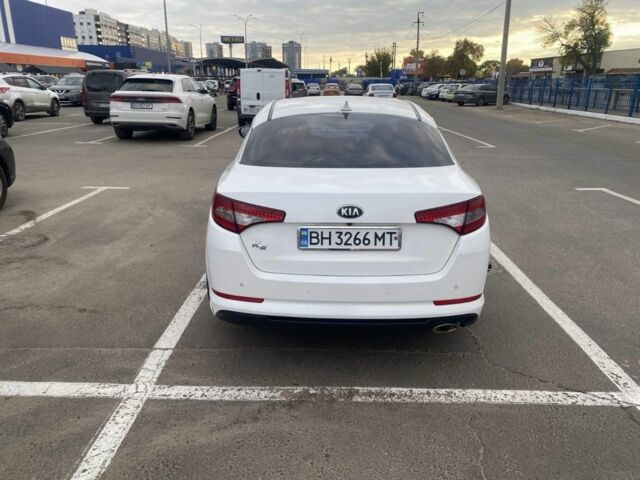 Белый Киа Оптима, объемом двигателя 2 л и пробегом 290 тыс. км за 6999 $, фото 3 на Automoto.ua