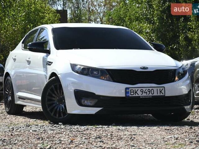 Білий Кіа Оптіма, об'ємом двигуна 2.36 л та пробігом 215 тис. км за 8850 $, фото 1 на Automoto.ua