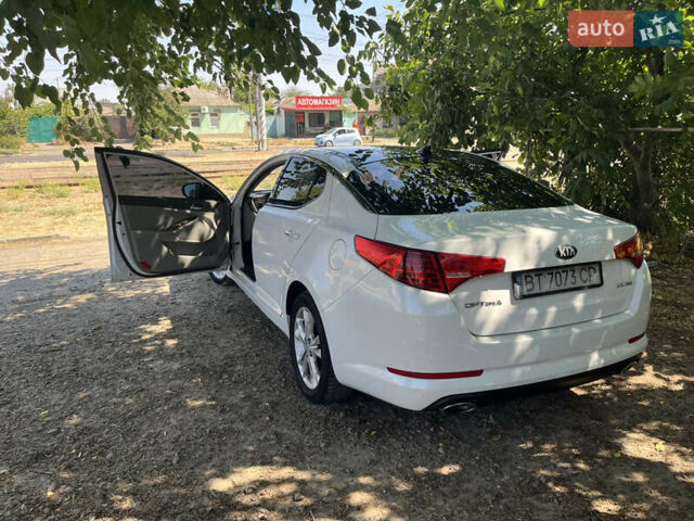 Білий Кіа Оптіма, об'ємом двигуна 2.36 л та пробігом 200 тис. км за 7500 $, фото 6 на Automoto.ua