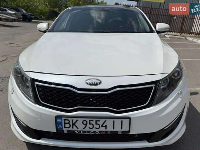 Белый Киа Оптима, объемом двигателя 1.69 л и пробегом 241 тыс. км за 12950 $, фото 1 на Automoto.ua