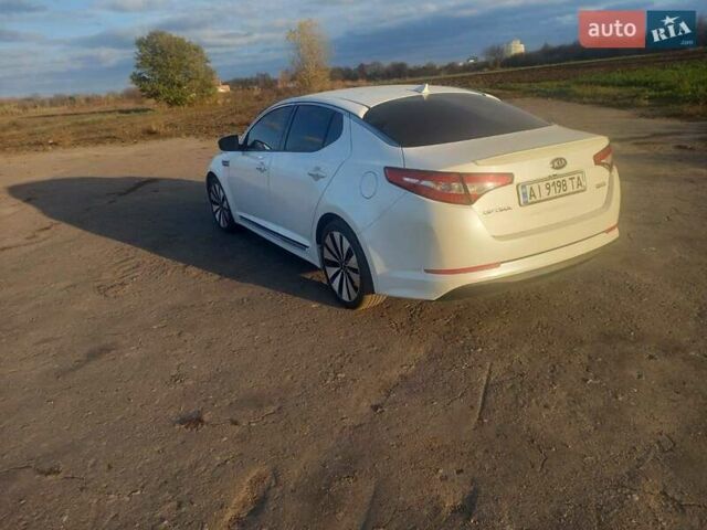 Белый Киа Оптима, объемом двигателя 2.36 л и пробегом 180 тыс. км за 8800 $, фото 6 на Automoto.ua