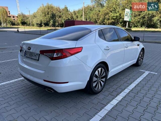 Белый Киа Оптима, объемом двигателя 2 л и пробегом 150 тыс. км за 9800 $, фото 9 на Automoto.ua