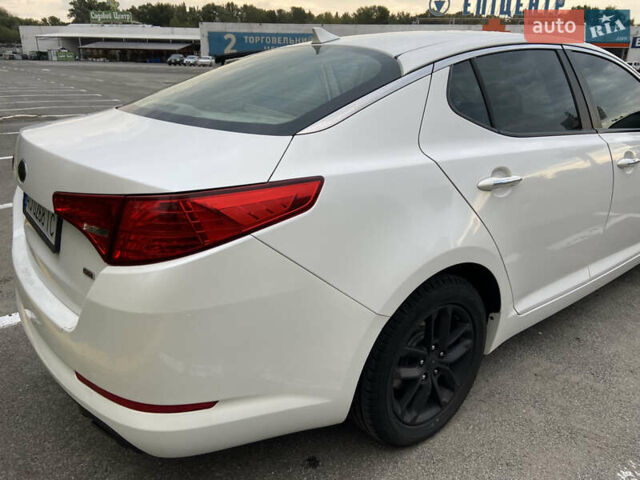 Білий Кіа Оптіма, об'ємом двигуна 2.4 л та пробігом 260 тис. км за 7800 $, фото 12 на Automoto.ua