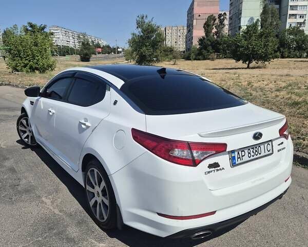 Белый Киа Оптима, объемом двигателя 2 л и пробегом 85 тыс. км за 12500 $, фото 6 на Automoto.ua