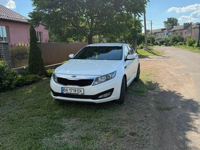 Белый Киа Оптима, объемом двигателя 2 л и пробегом 180 тыс. км за 9000 $, фото 20 на Automoto.ua