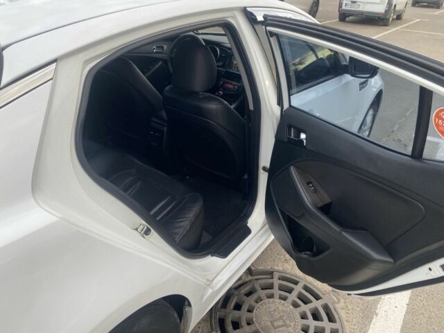 Белый Киа Оптима, объемом двигателя 2 л и пробегом 290 тыс. км за 6999 $, фото 8 на Automoto.ua