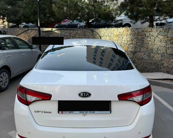 Білий Кіа Оптіма, об'ємом двигуна 2 л та пробігом 187 тис. км за 10900 $, фото 2 на Automoto.ua