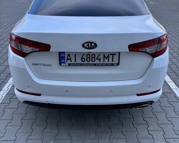 Белый Киа Оптима, объемом двигателя 2 л и пробегом 150 тыс. км за 9800 $, фото 7 на Automoto.ua